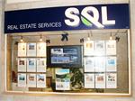 SQL Real Estate, The Company