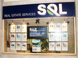 SQL Real Estate, The Company